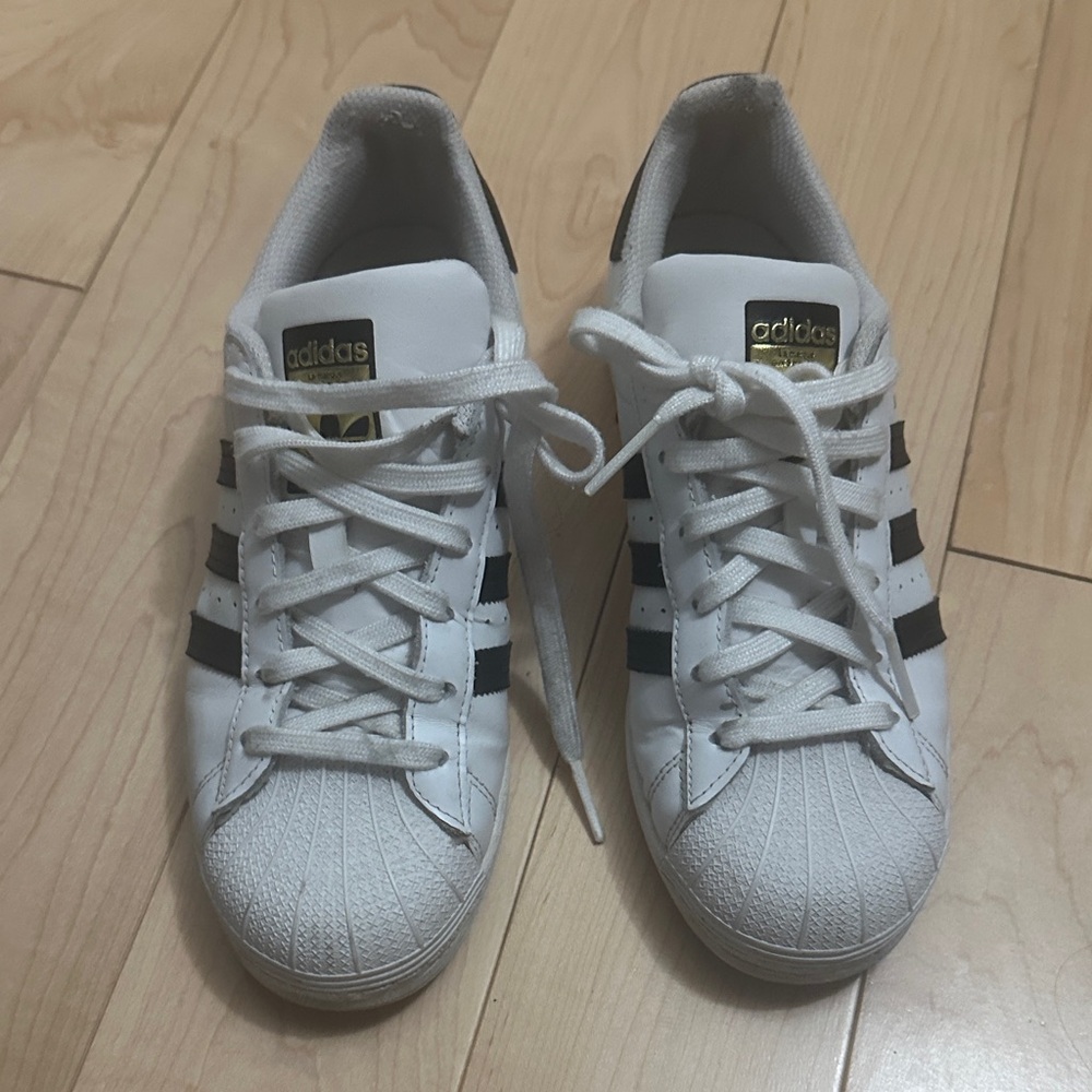 Adidas Women's White and Black Striped Sneakers